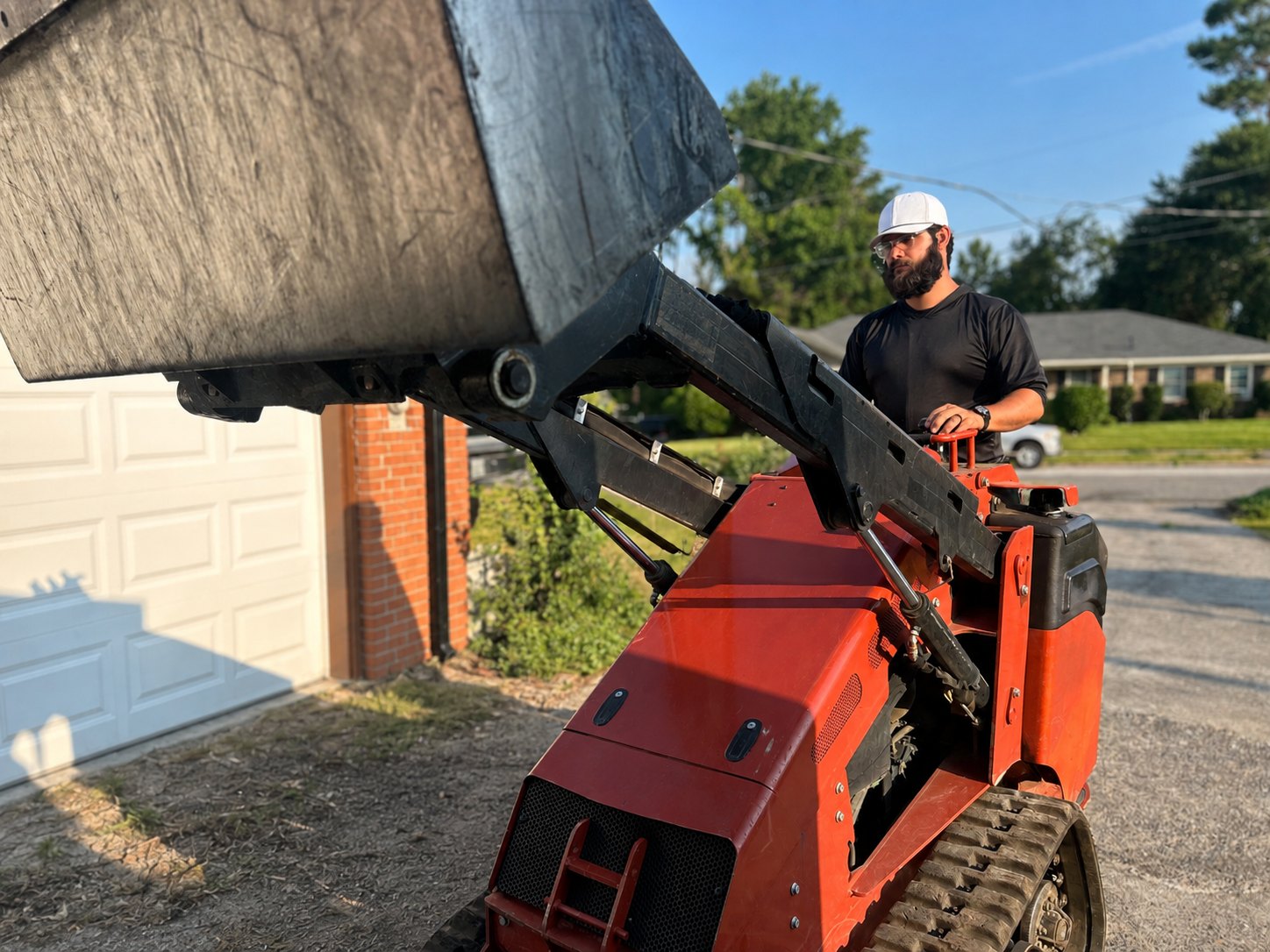 Andre Nava operating construction equipment